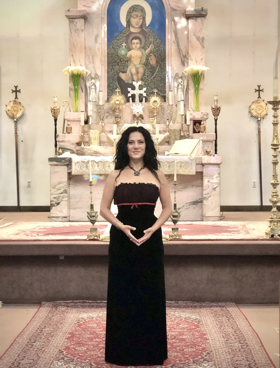 Anahit performing at church altar