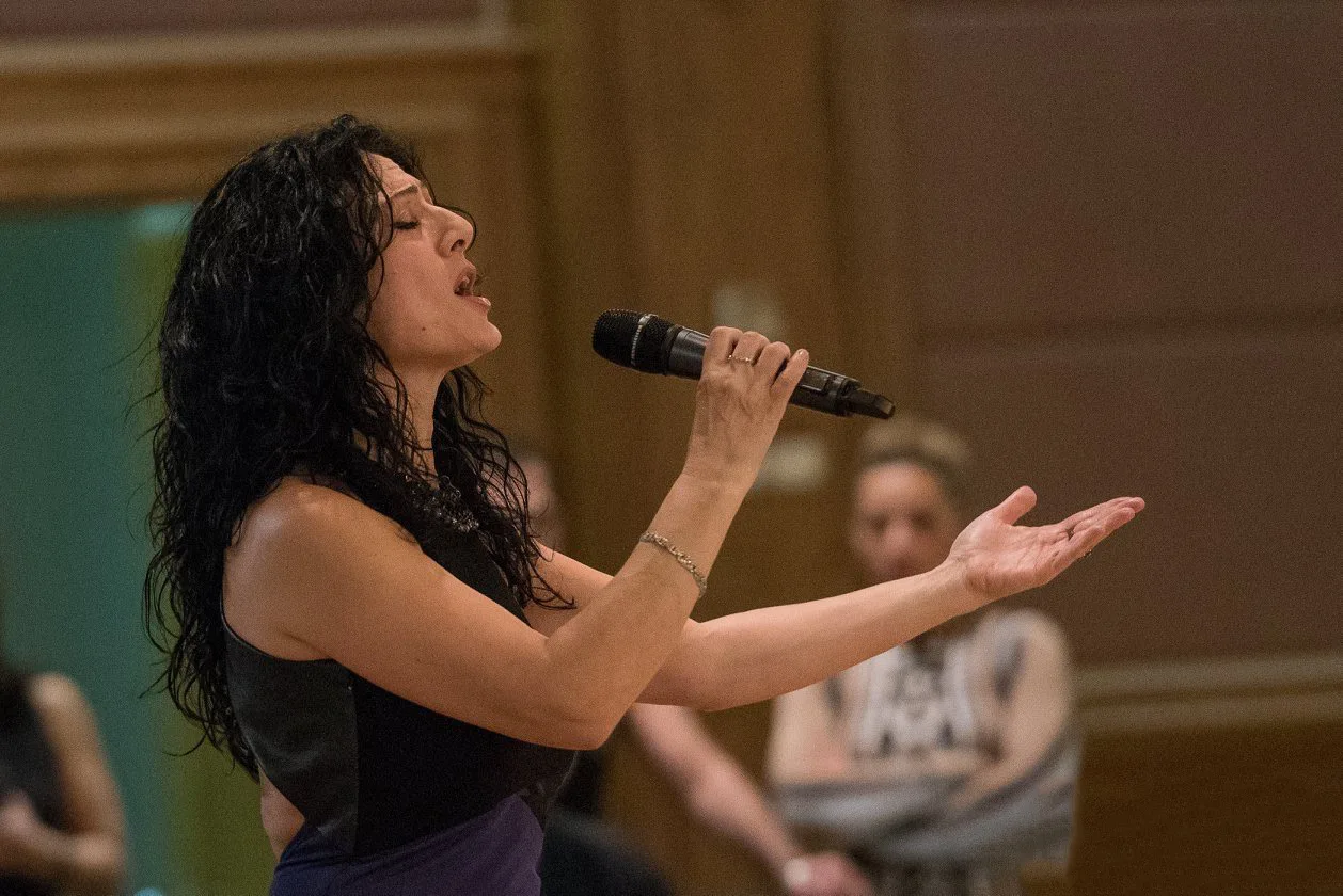 Anahit singing at a concert