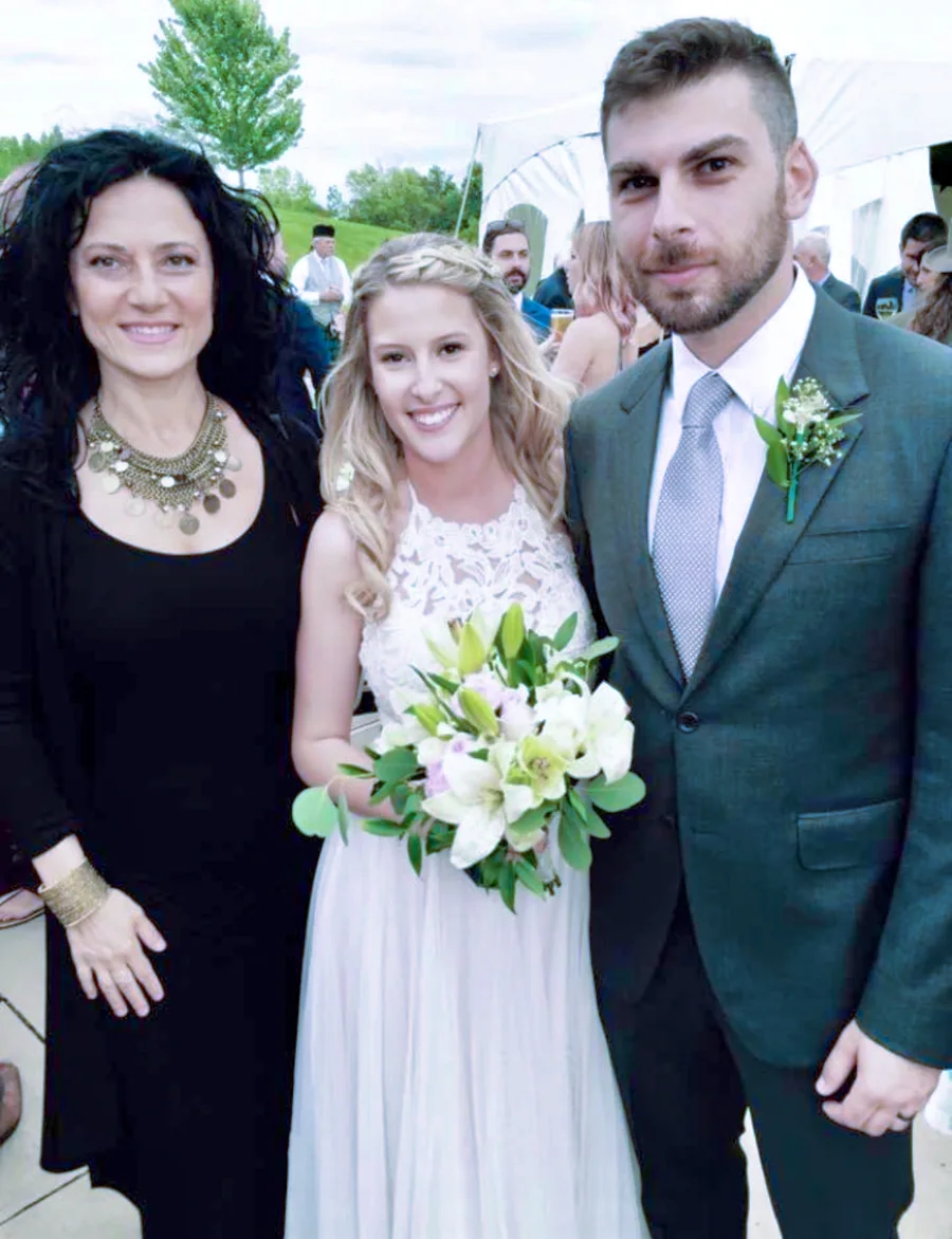 Anahit with an outdoor wedding couple